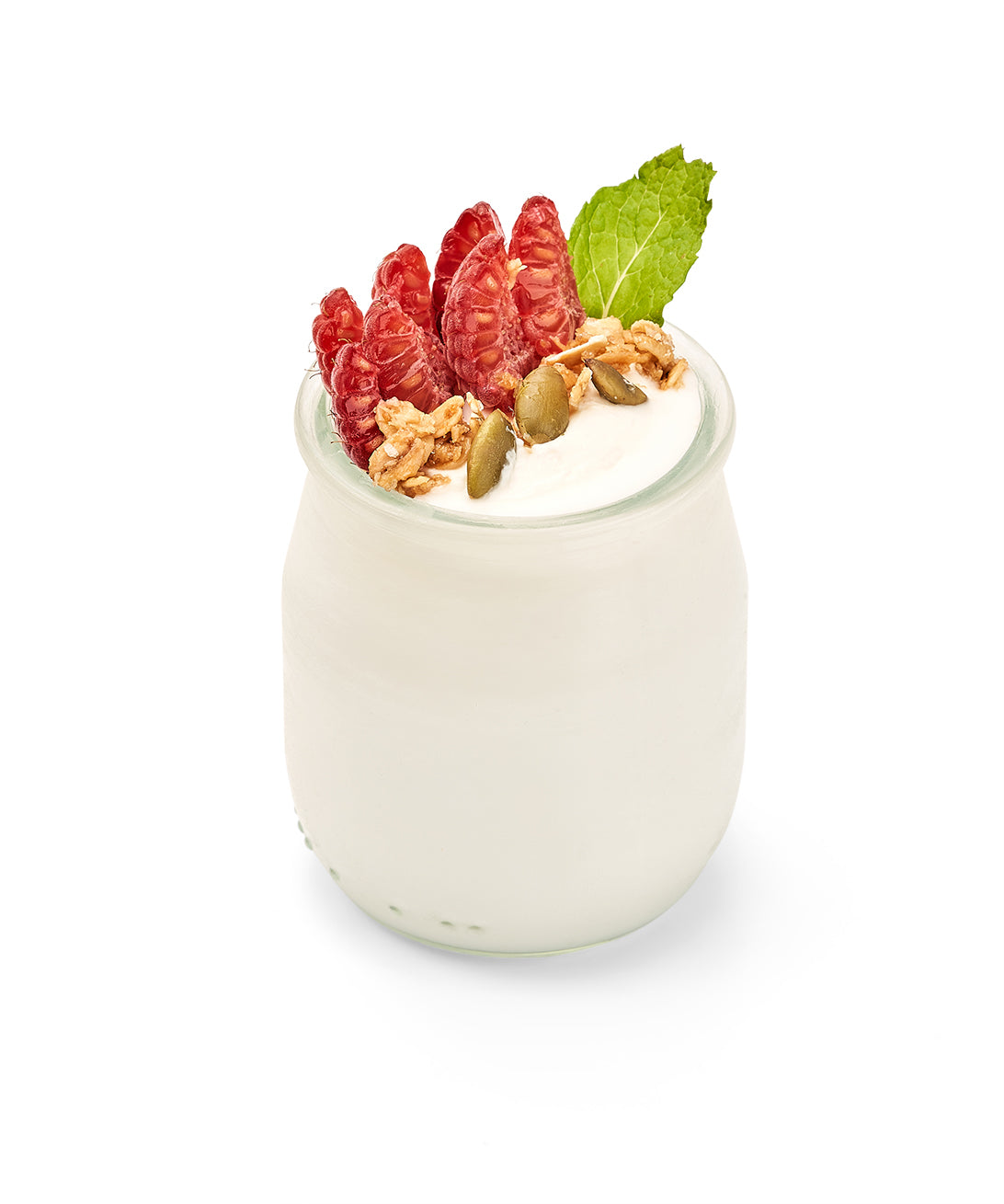 White yogurt in a glass jar with raspberries, granola and a mint leaf