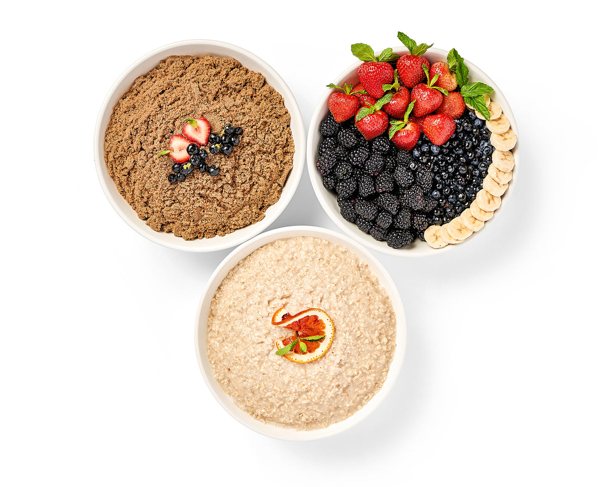 Three Oatmeal Bars with Toppings of seasonal berries and granola.