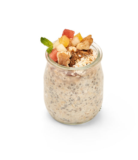 Blueberry chia pudding in a Overnight Oatmeal Jar- Cinnamon-Spiced with cinnamon-spiced nuts.