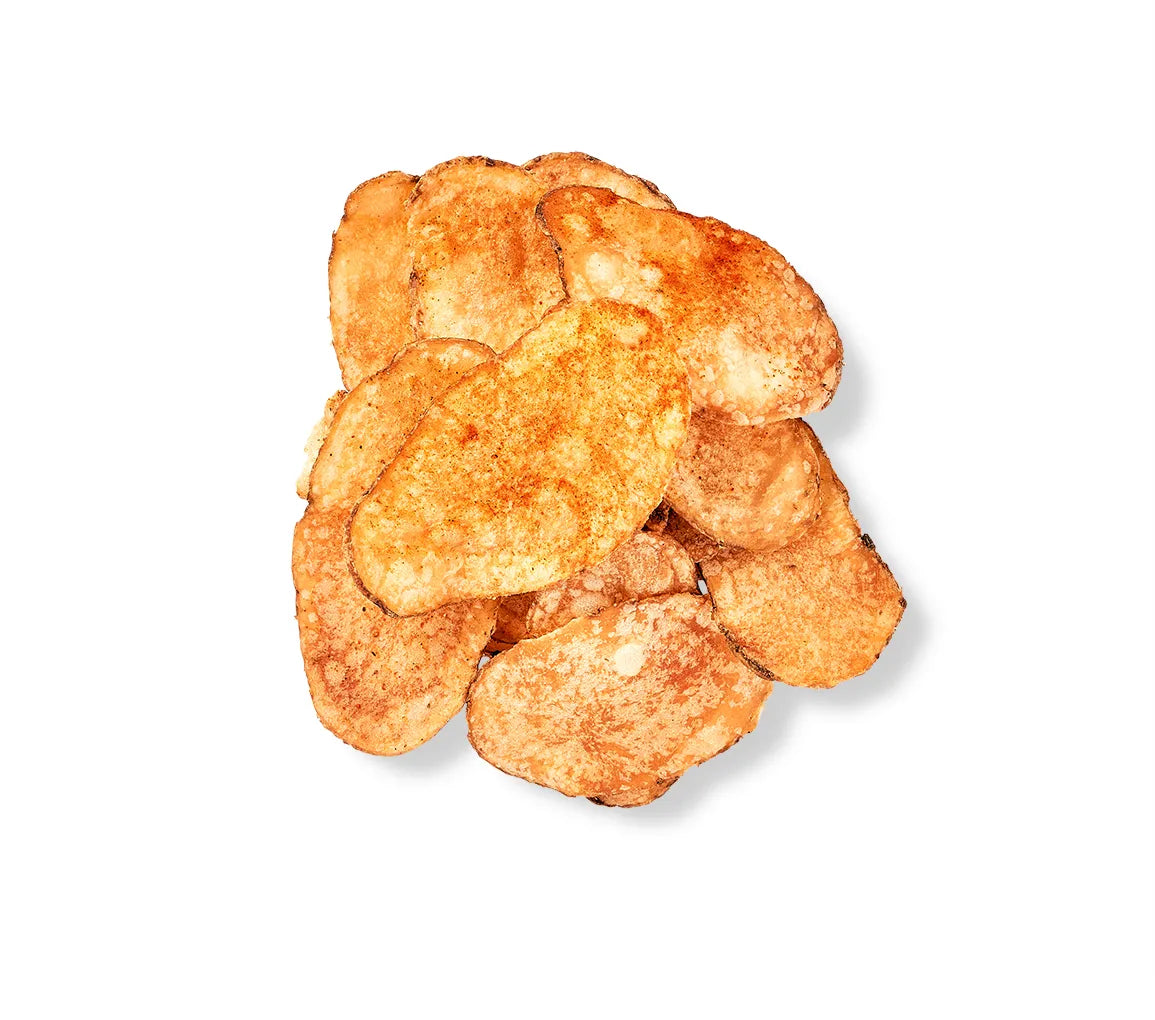 A pile of Homemade Chips and Dip on a white background.